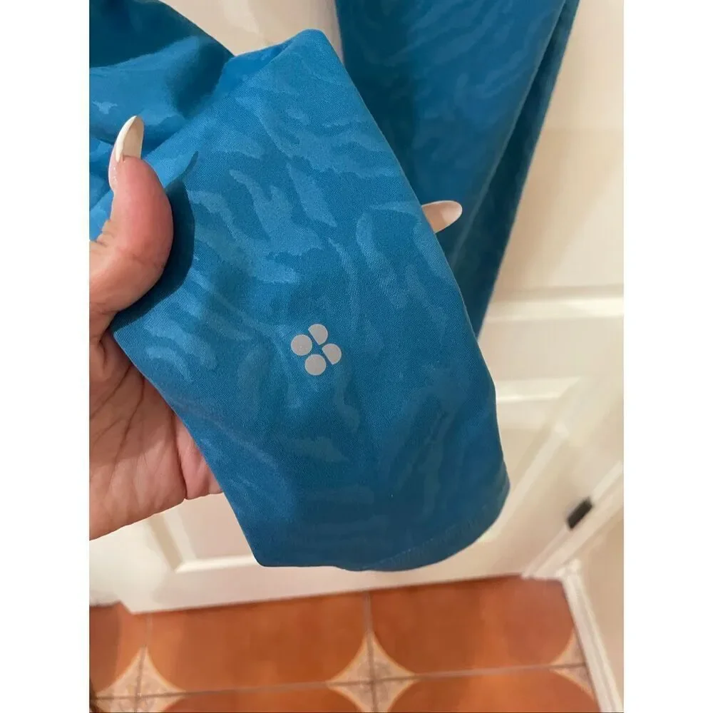 SWEATY BETTY All Day High Waist Emboss Leggings Blue Tiger size 10/large